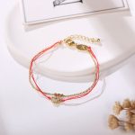 Red String Lucky Clover Bracelet - Professional Photo