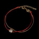 Red String Lucky Clover Bracelet - Professional Photo