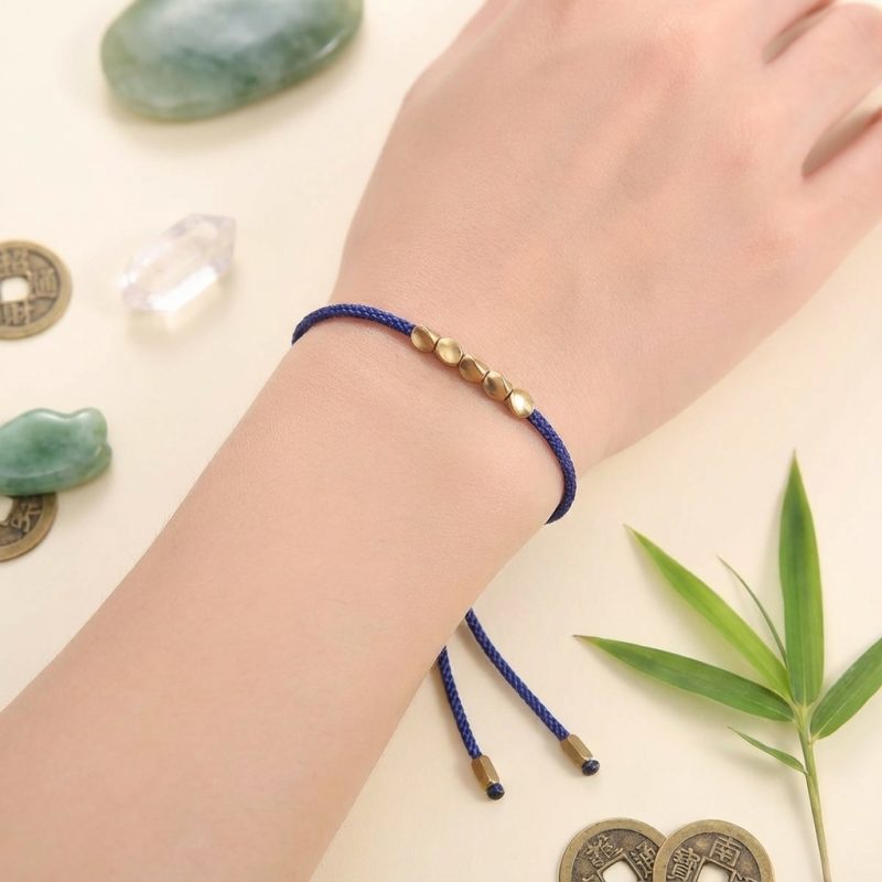 Five Lucky Beads Copper Bracelet - Blue & Red String - Professional Photo