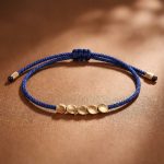 Five Lucky Beads Copper Bracelet - Blue & Red String - Professional Photo