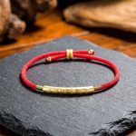 Tibetan Red/Gold String Bracelet - Buddhist Lucky Charm - Professional Photo